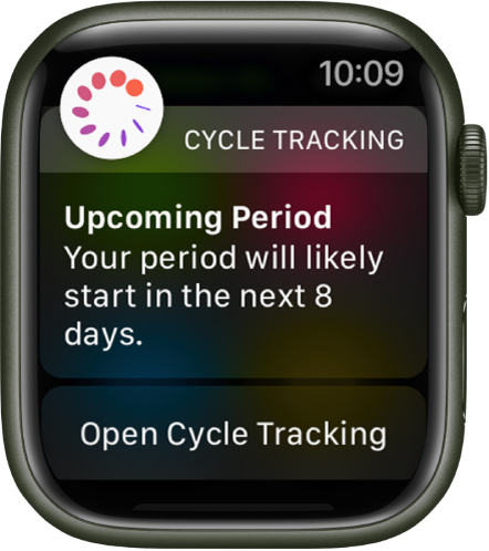 „Apple Watch“ su mėnesinių prognozės ekranu, kuriame rodomas pranešimas „Netrukus prasidės mėnesinės. Tikėtina mėnesinių pradžia per 8 dienas“. Apačioje rodomas programos „Cycle Tracking“ atidarymo mygtukas.