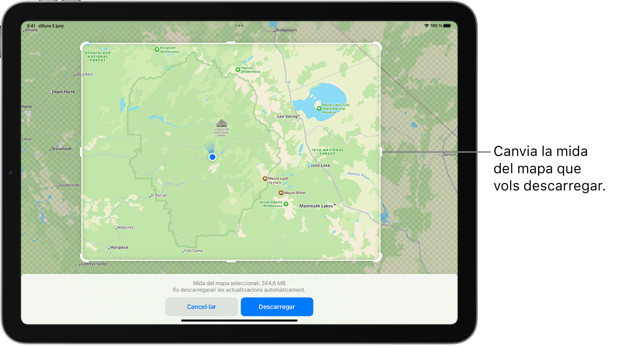Un iPad amb un mapa d’un parc nacional. El parc està envoltat d’un rectangle amb marcadors, que es poden moure per canviar la mida del mapa per descarregar-lo. La mida de descàrrega del mapa seleccionada s’indica a prop de la part inferior del mapa. Els botons “Cancel·lar” i “Descarregar” es troben a la part inferior de la pantalla.