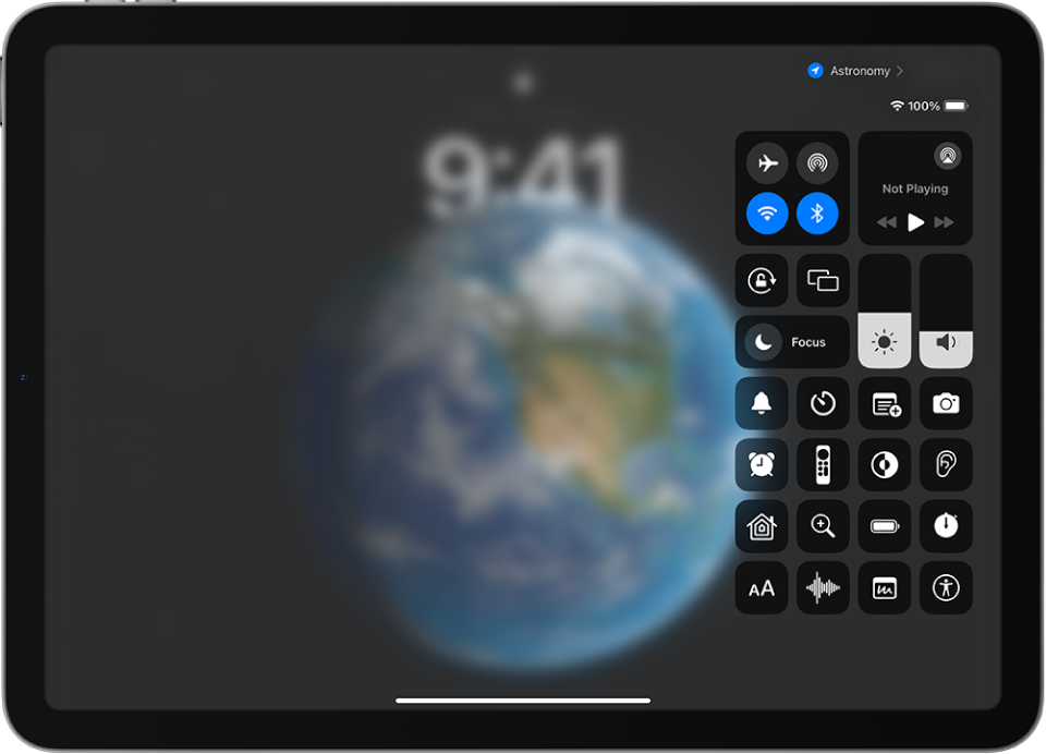 The Control Center on iPad customized with additional controls such as Timer, Stopwatch, and Voice Memos.