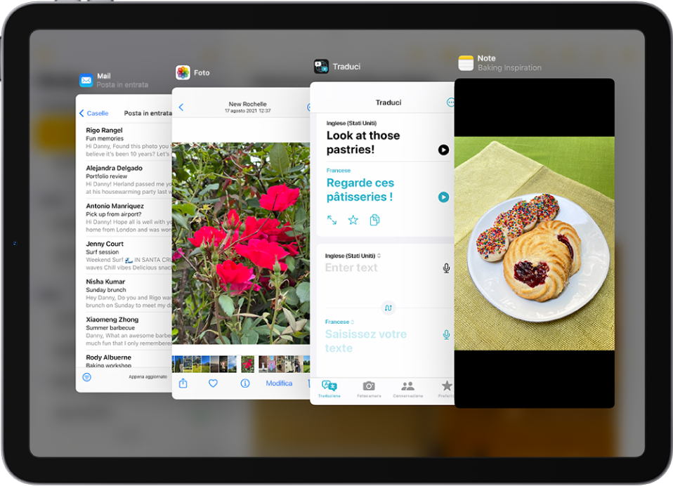 Quattro app aperte in finestre Slide Over, tra cui Mail, Foto, Traduci e Note.
