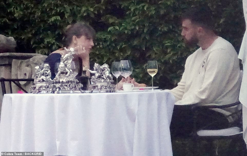 The couple held hands as they enjoyed a deep chat over dinner
