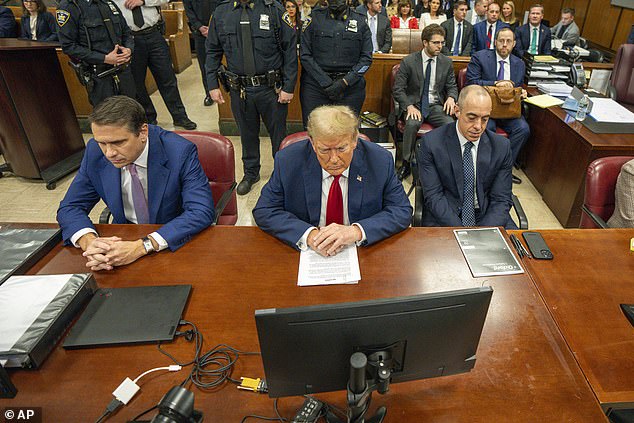 Donald Trump seated in court between his lawyers Todd Blanche (left) and Emil Bove (right) on May 16. On Thursday Blanche refused to rule out Trump testifying in his own defense