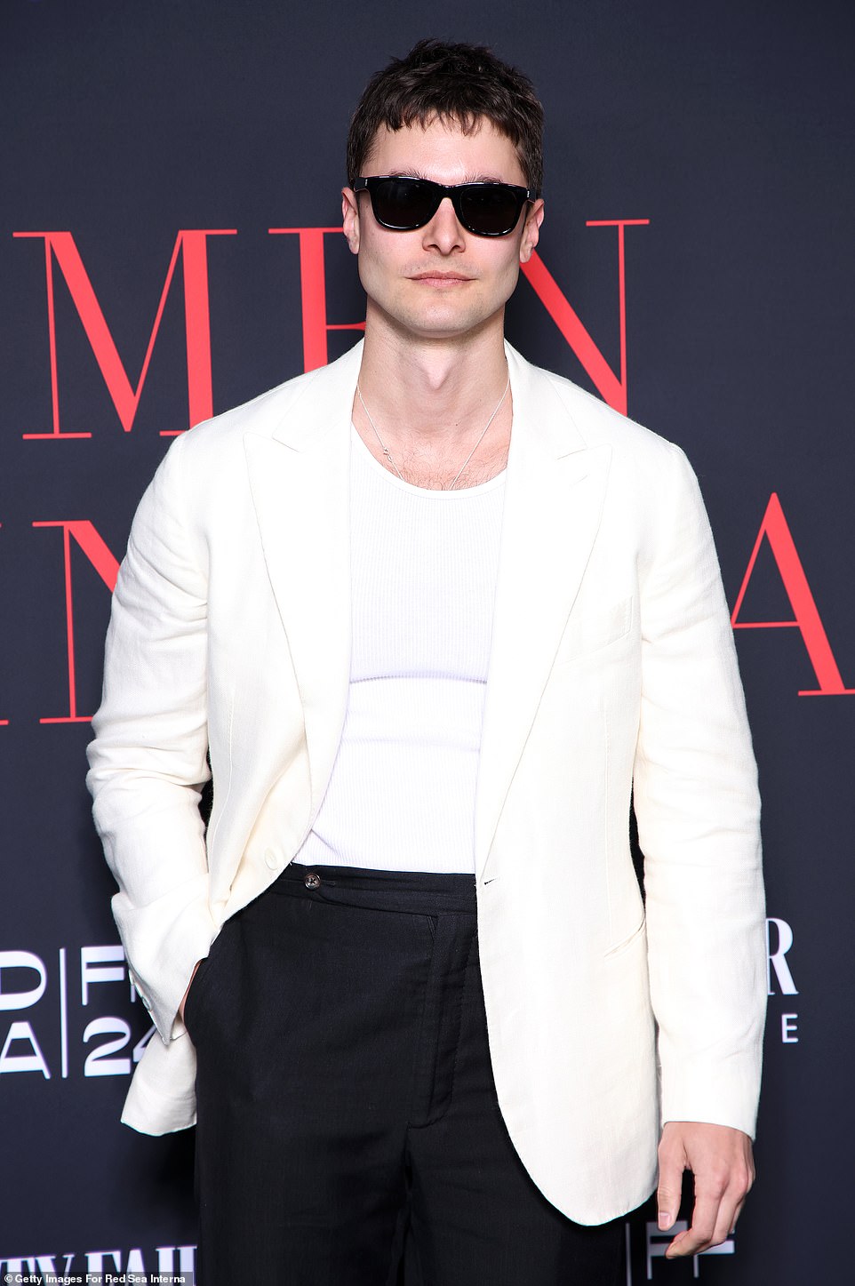 Dorian Grinspan looked handsome in a white henley shirt paired with a cream blazer and black trousers. The editor-in-chief of international fashion magazine Out of Order sported a pair of black wayfarer sunglasses on the red carpet