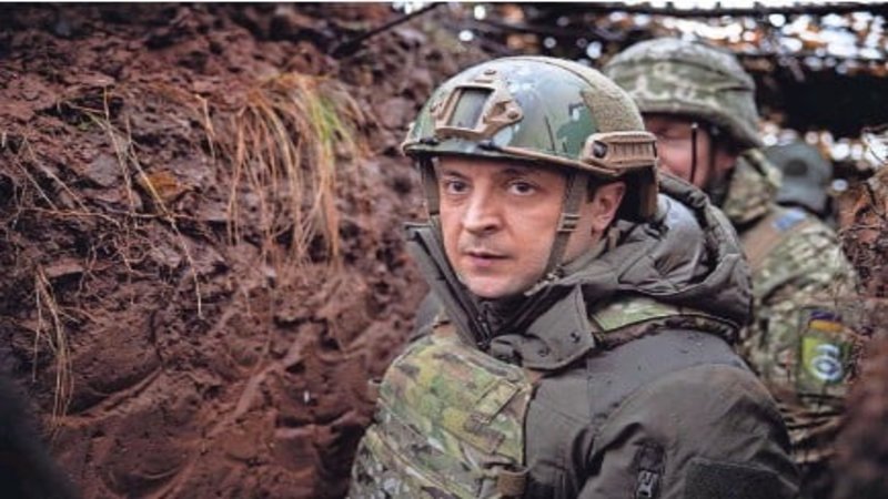 An image of Ukrainian President Volodymyr Zelenskyy wearing body armor and a helmet.