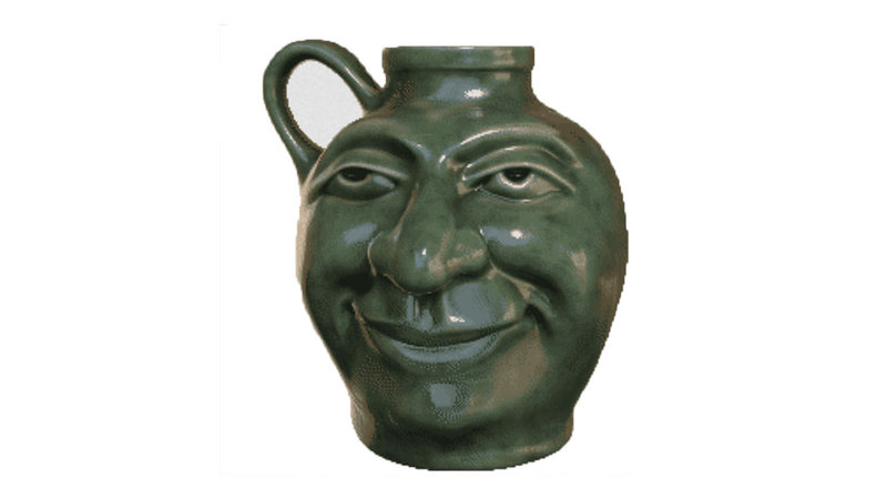 Smug Jug meme depicting a green ceramic vase or jug with a face on the side.