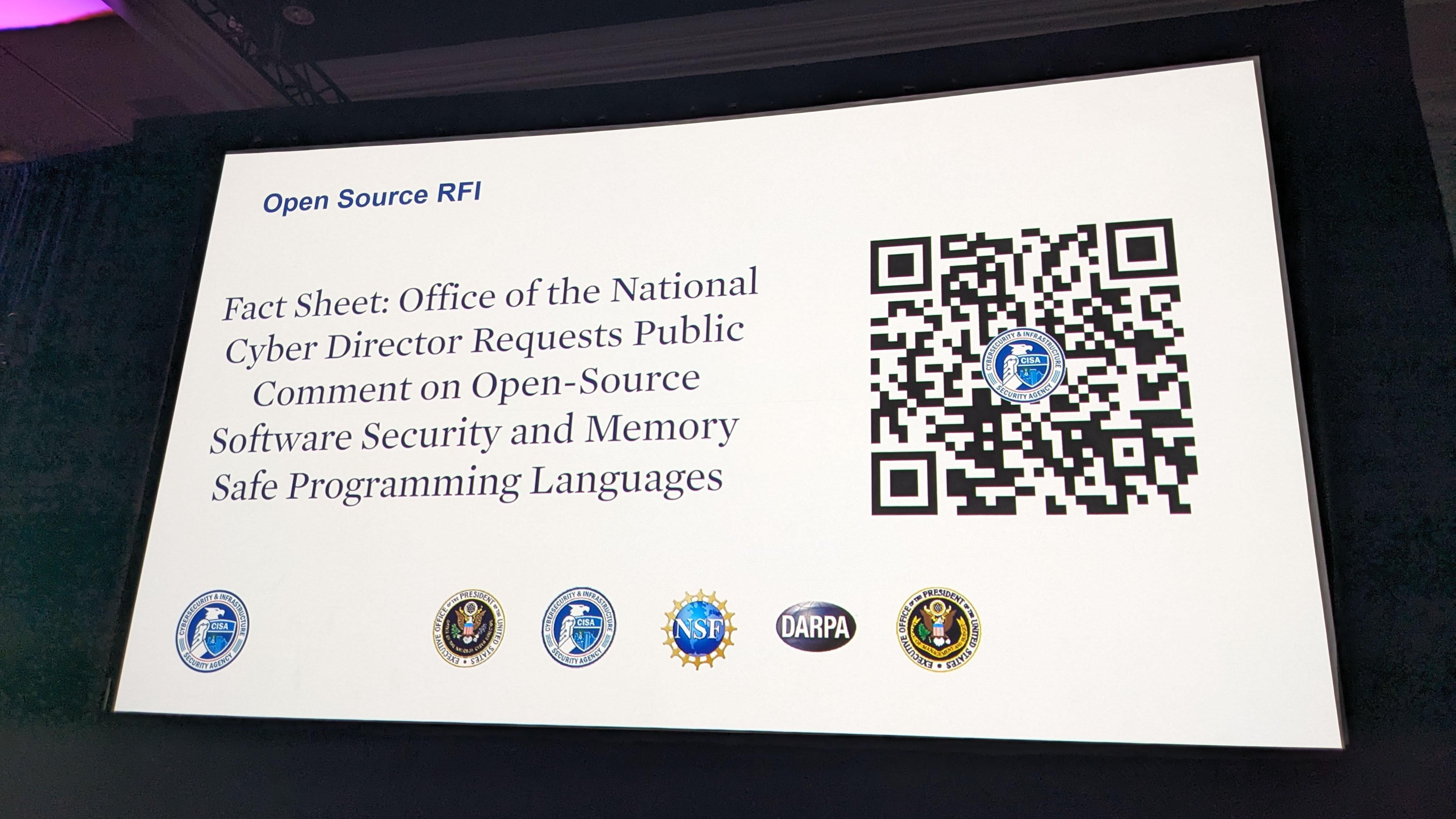 Slide presented during the CISA talk features a QR code linking to the White House RFI on memory-safe languages and open-source security