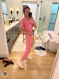 Pink jumpsuit from Lulus and white and pink Nikes