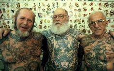 three older men with tattoos on their bodies