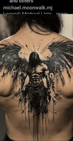 the back of a man's chest with an angel tattoo on it