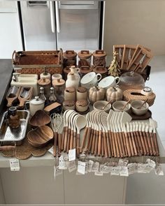 an assortment of kitchen utensils on a counter