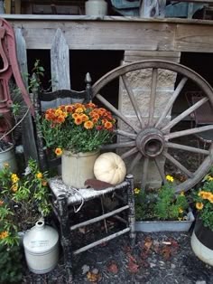 Rustic Fall Decor: Vintage Garden Wagon with Pumpkins and Flowers