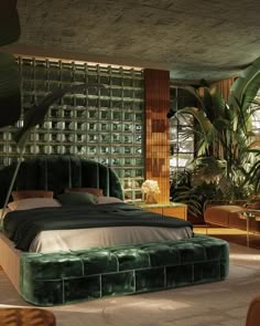 a large bed sitting in the middle of a bedroom next to a plant filled wall