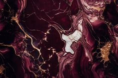 an abstract marble background with gold and maroon colors, like this one in the style of art deco