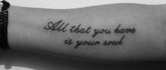 a person's arm with a tattoo saying all that you have is your soul