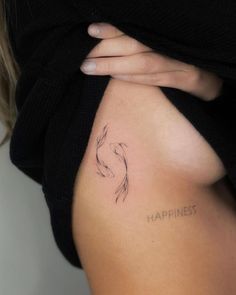 a woman's stomach with the word happiness written in cursive writing on it