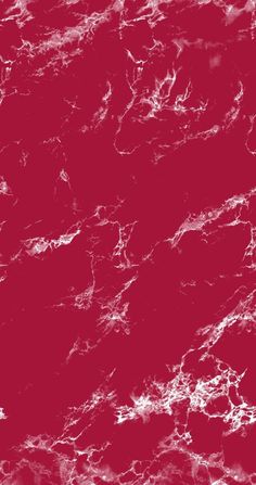a red marble textured background with white swirls
