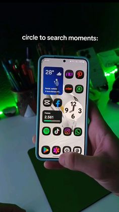 a person holding a remote control in their hand with the caption circle to search moments