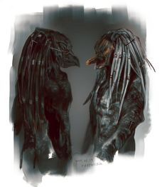 two large black birds standing next to each other