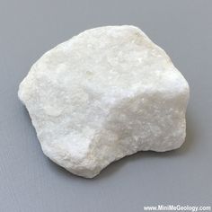 a white rock sitting on top of a table