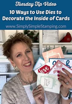 a woman holding up some cards with the words 10 ways to use dies to decorate the inside of cards