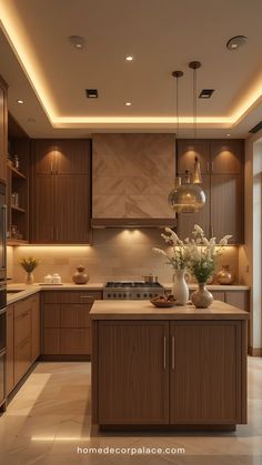 a modern kitchen with wooden cabinets and lights