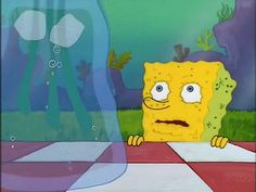 an animated spongebob sitting on top of a table