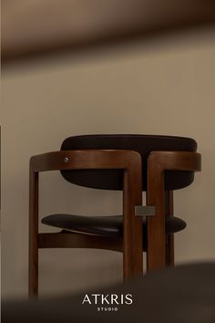 two chairs sitting side by side next to each other