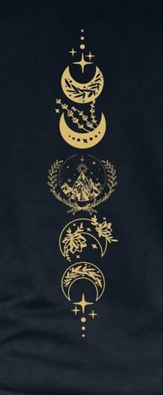 a black t - shirt with gold designs on it