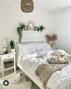 Minimalist Bedroom with White Bedding and Plants