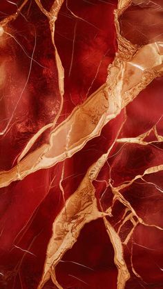 an abstract red and gold marble background