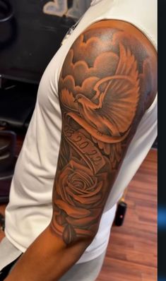 a man with a tattoo on his arm