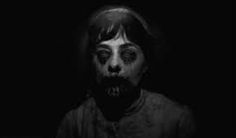 an image of a creepy woman in the dark