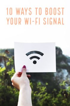 someone holding up a sign with the words 10 ways to booster your wi - fi signal