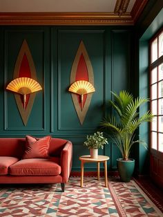 a living room with green walls, red couch and potted plant in the corner