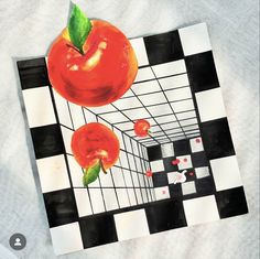 a piece of paper with an apple and two oranges in it on a black and white checkered surface
