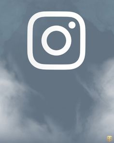 the instagram logo is shown in front of a cloudy sky