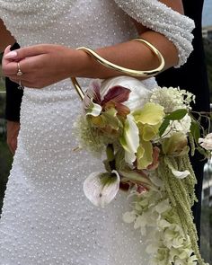 Trend: Accessory-Style Bridal Bouquet Purses & Bouquet Bags in 2025 | Unique bridal bouquets, Wedding flowers, Bridal bouquet