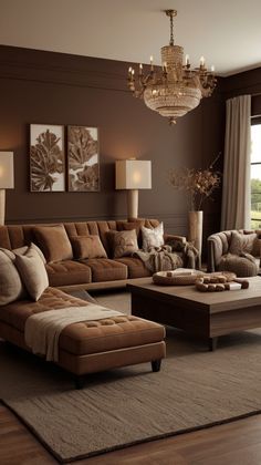 a living room filled with lots of furniture and a chandelier hanging from the ceiling