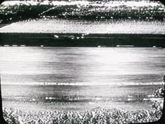 black and white photograph of water in the ocean