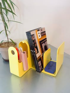 Book Standy in 2025 | Cool desk accessories, Desk organization, Objects design