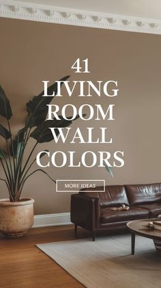 a living room with brown leather couches and large potted plant