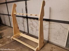 Took a day, about $30 in materials. | Wooden guitar stand, Diy guitar stand, Guitar stand