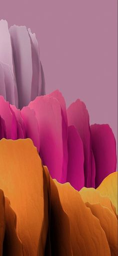 an abstract image of mountains and rocks with blue sky in the backgrouund