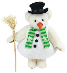 a stuffed snowman is holding a broom