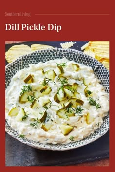 the cover of dill pickle dip is shown in a bowl with crackers