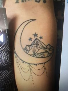 a person with a tattoo on their leg