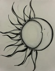 a drawing of a sun that has been drawn on paper
