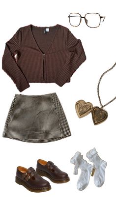 Alt dark academia look with gingham mini skirt, brown cardigan, brown Mary Jane’s with lace trim socks, accessorize with brown glasses and gold locket