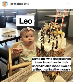 a baby sitting in a high chair next to an ice cream sundae