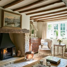 a living room filled with furniture and a fire place
